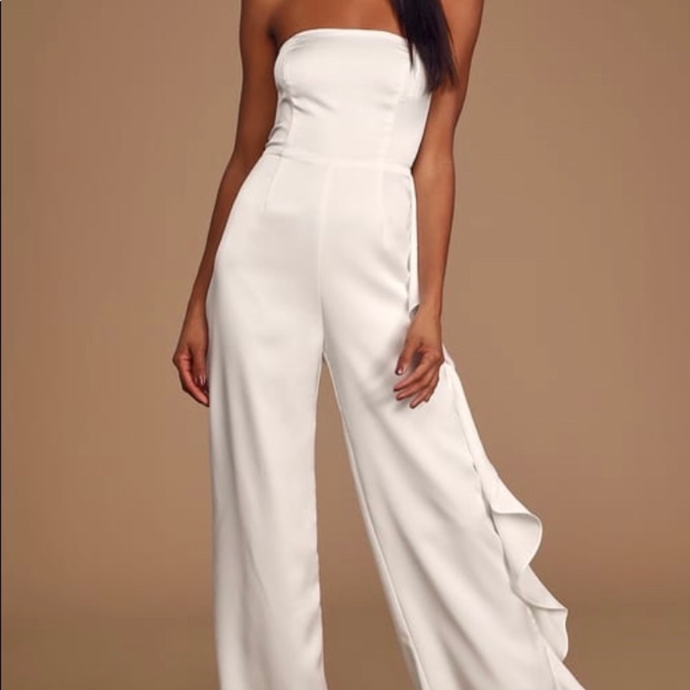 Never worn, tags attached, too small.